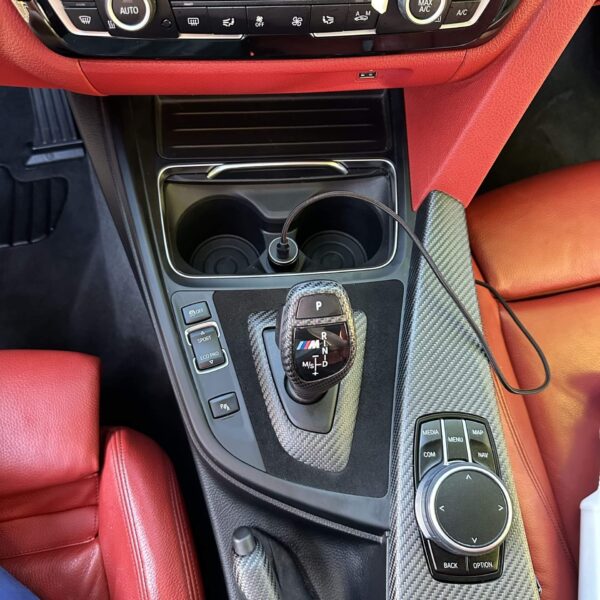 interior detailing of a car in Monmouth with red leather seats.